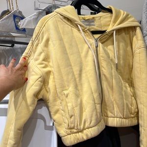 Yellow quilted urban outfitters zip up jacket with hood